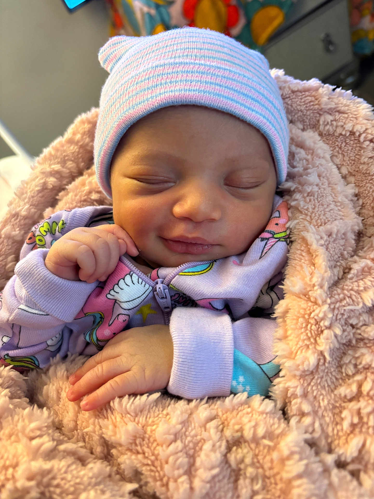 Rylynn joined the competition — help win amazing prizes! baby, newborn, infant, sleeping, smiling, blanket, hat, onesie, cozy, soft, cute, child, peaceful, portrait, indoors, warm, hand, face, closeup, resting