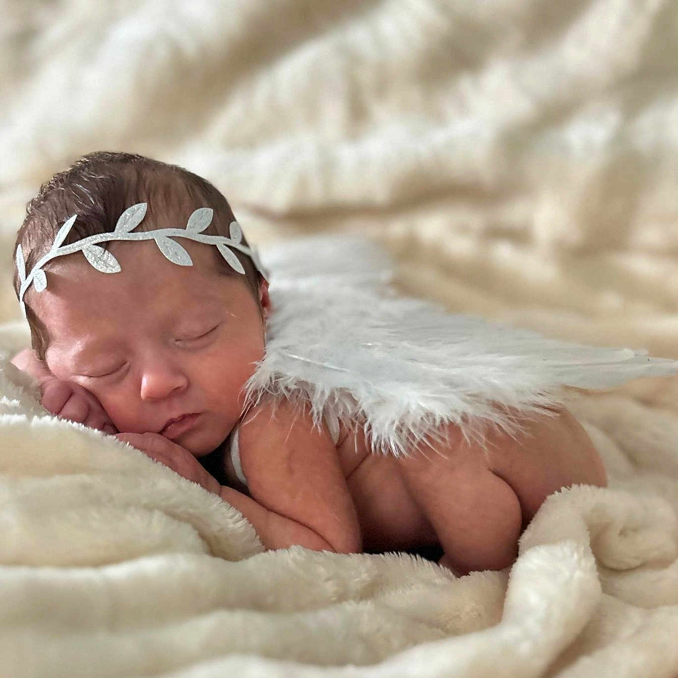 Delilah is registered to the contest to win money with this photo: baby, blanket, childbirth, face, head, newborn, person, photography, portrait, sleeping