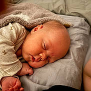 Ilaria is registered to the contest to win money with this photo: baby, sleeping, blanket, pillow, cozy, infant, child, bed, soft, cute, peaceful, skin, face, hand, clothing, indoors, rest, nap, newborn, toddler