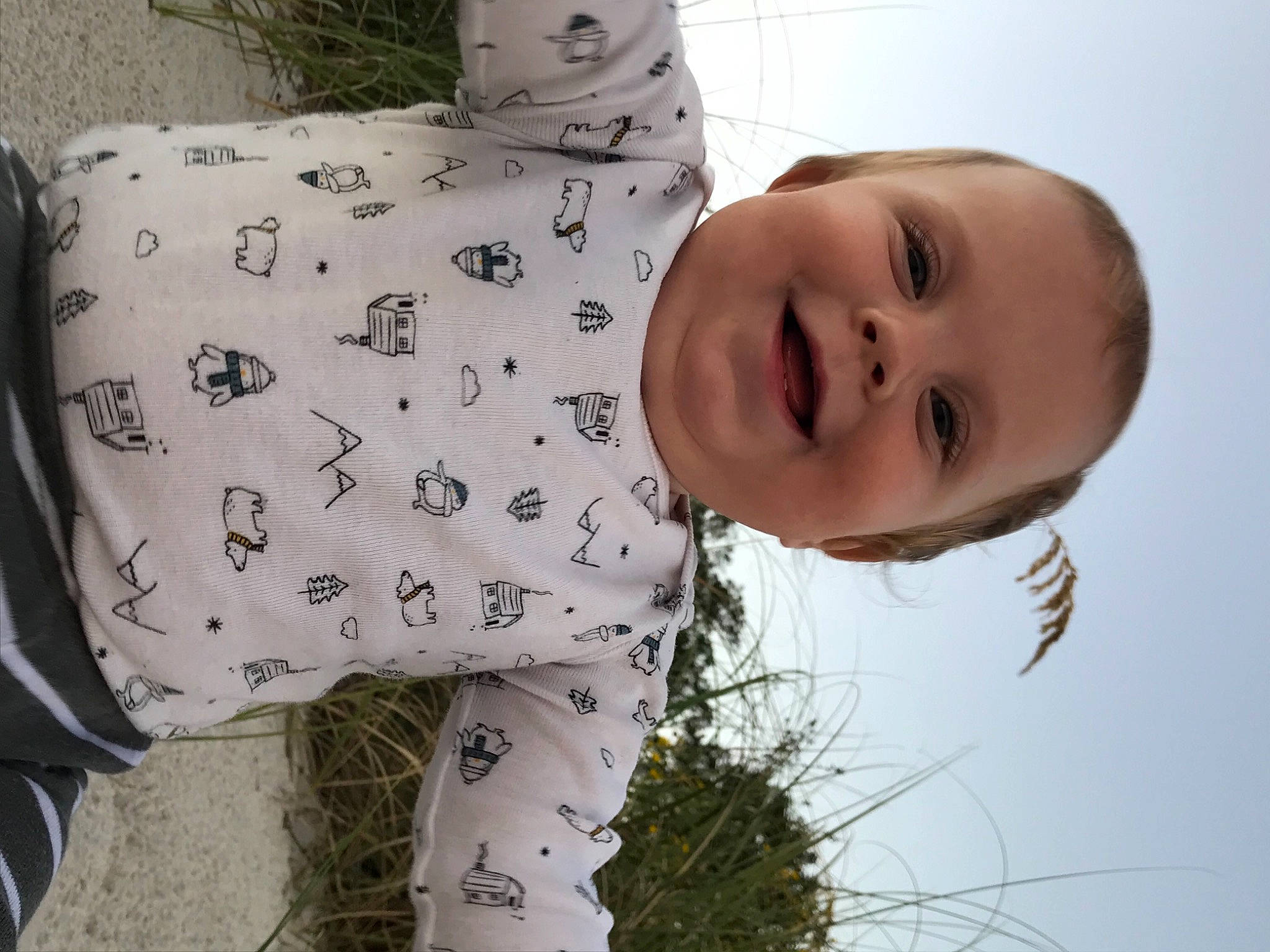 Apollo is registered to the contest to win money with this photo: baby, cheek, child, head, joy, pattern, person, plant, smile, textile, toddler, tree