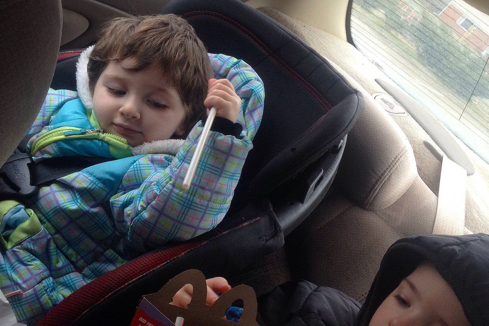 Everlie is registered to the contest to win money with this photo: car, car_seat, child, day, driving, eye, family_car, fun, girl, person, product, sitting, snapshot, toddler, vehicle