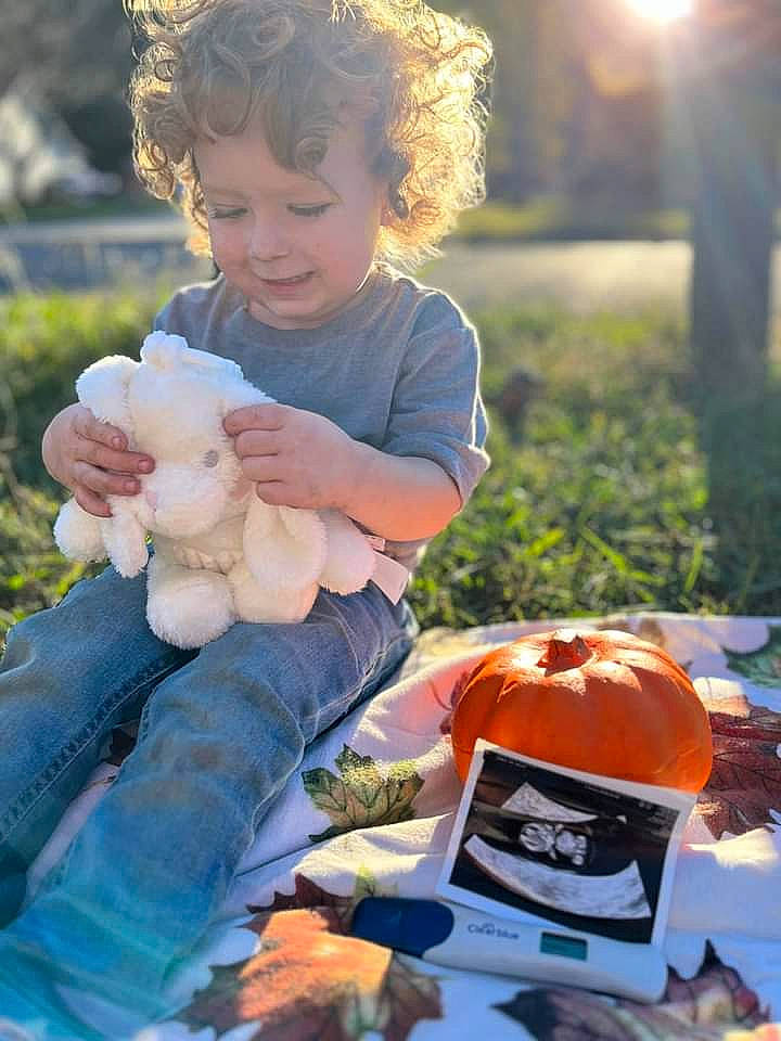 Elijah joined the competition — help win amazing prizes! baby_toddler_clothing, calabaza, child, cucurbita, fruit, fun, gourd, grass, happy, jeans, leaf, orange, people_in_nature, person, plant, pumpkin, squash, summer, toddler, vegetable