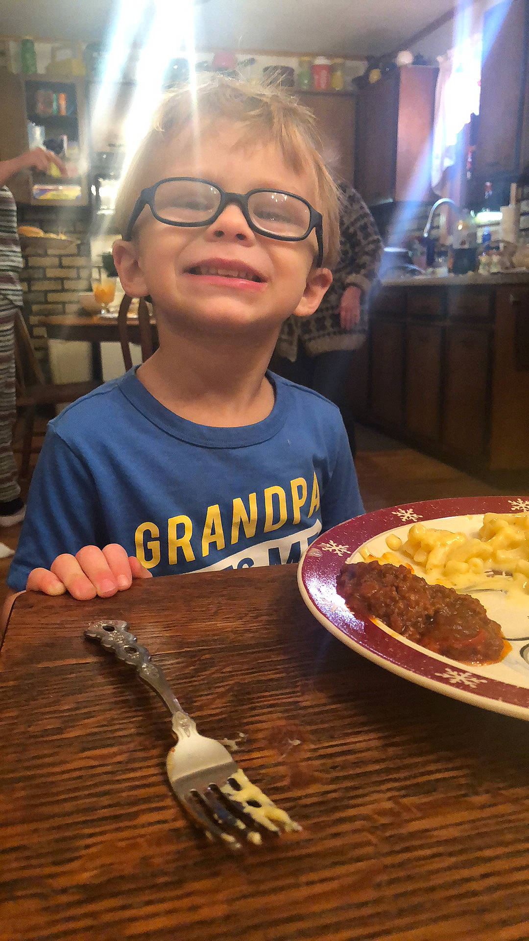 Finley is registered to the contest to win money with this photo: baked_goods, baking, chair, comfort_food, cuisine, dessert, dish, eyewear, finger_food, food, glasses, ingredient, joy, junk_food, person, plate, recipe, smile, sweetness, table