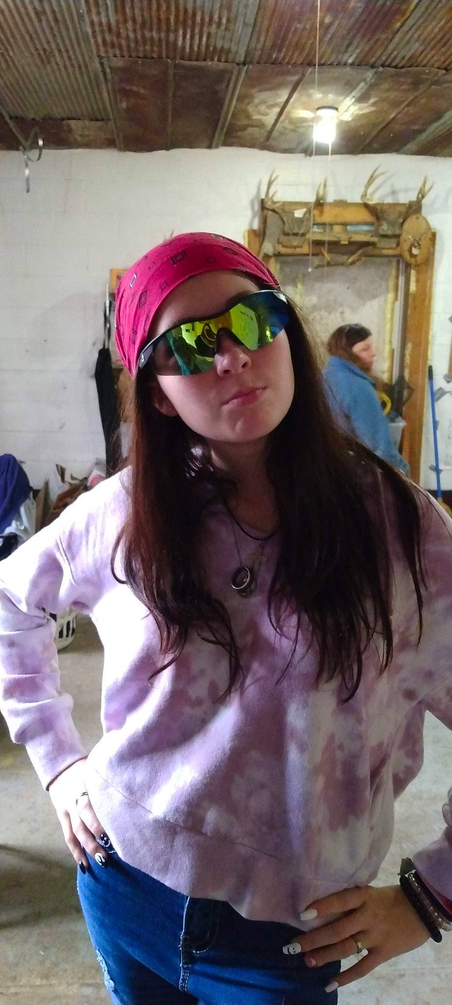 Jaden is registered to the contest to win money with this photo: black_hair, blurred, clothing, eyewear, fashion, fun, glasses, goggles, happy, head, headgear, headwear, human_body, lip, outerwear, person, pink, plant, purple, sleeve