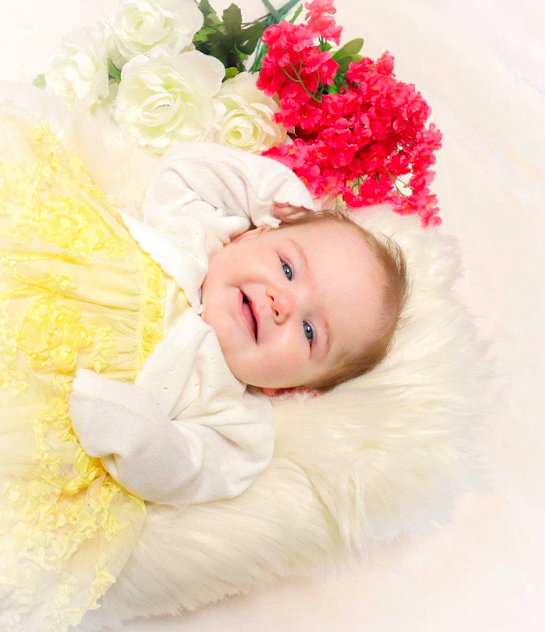 Juliet is registered to the contest to win money with this photo: baby, baby_toddler_clothing, beauty, comfort, dress, flash_photography, flower, flower_arranging, happy, head, headpiece, hybrid_tea_rose, person, petal, pink, plant, red, rose, smile, textile