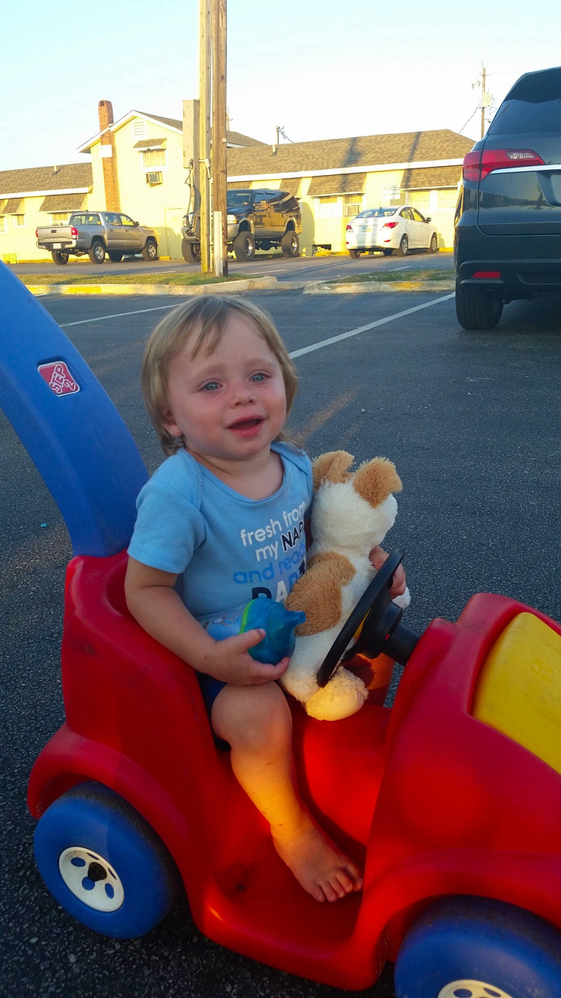 Nathaniel joined the competition — help win amazing prizes! blue, car, child, fun, land_vehicle, leisure, mode_of_transport, motor_vehicle, people, person, photograph, product, riding_toy, smile, snapshot, summer, tire, toddler, vehicle, vehicle_registration_plate