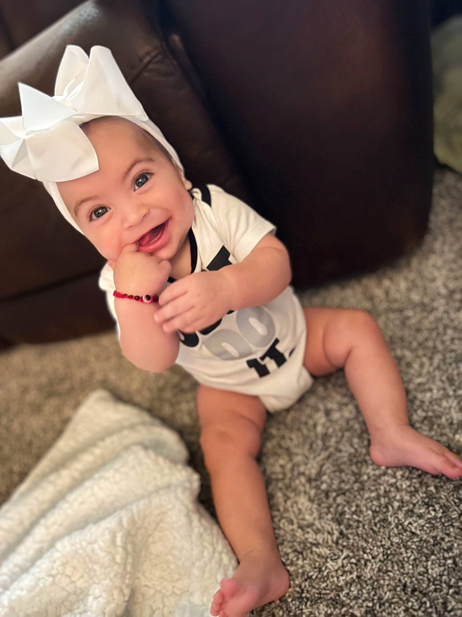 Kamila joined the competition — help win amazing prizes! baby_toddler_clothing, cap, chin, comfort, eye, finger, flash_photography, happy, head, headwear, human_body, knee, leg, mouth, neck, person, skin, sleeve, smile, t_shirt