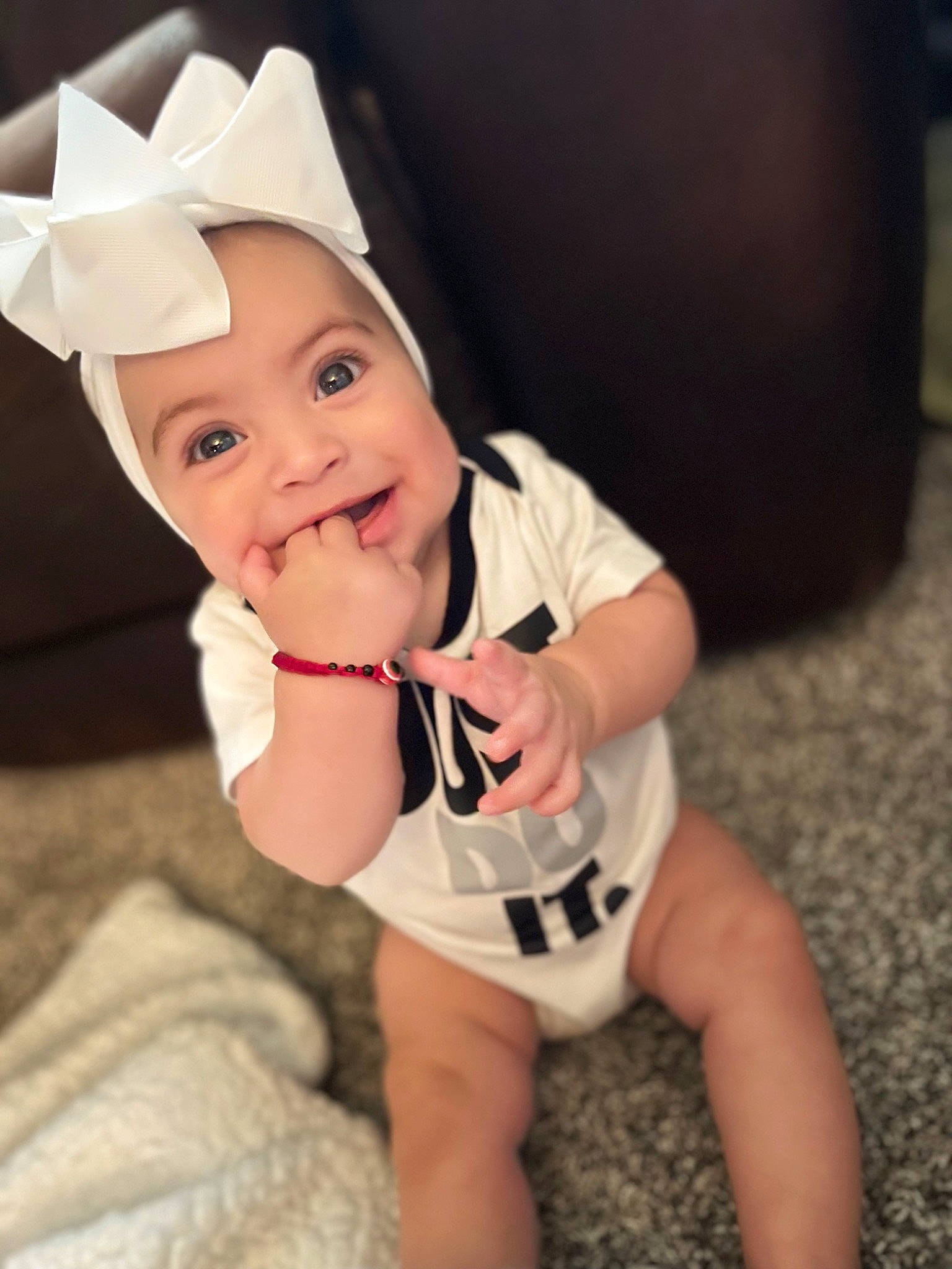 Kamila is registered to the contest to win money with this photo: baby, baby_toddler_clothing, baseball_cap, cap, costume_hat, elbow, eye, flash_photography, happy, hat, head, headwear, human_body, knee, neck, person, skin, sleeve, smile, t_shirt