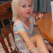 Loralie Rector joined the competition — help win amazing prizes! bunny_ears_filter, candid, casual, child, curtains, cute, easter, floor_tiles, girl, heart_freckles, indoor, kitchen, pink_headband, playful, sitting, smiling, striped_dress, table, text_overlay, wooden_chair