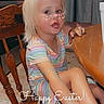 bunny_ears_filter, candid, casual, child, curtains, cute, easter, floor_tiles, girl, heart_freckles, indoor, kitchen, pink_headband, playful, sitting, smiling, striped_dress, table, text_overlay, wooden_chair