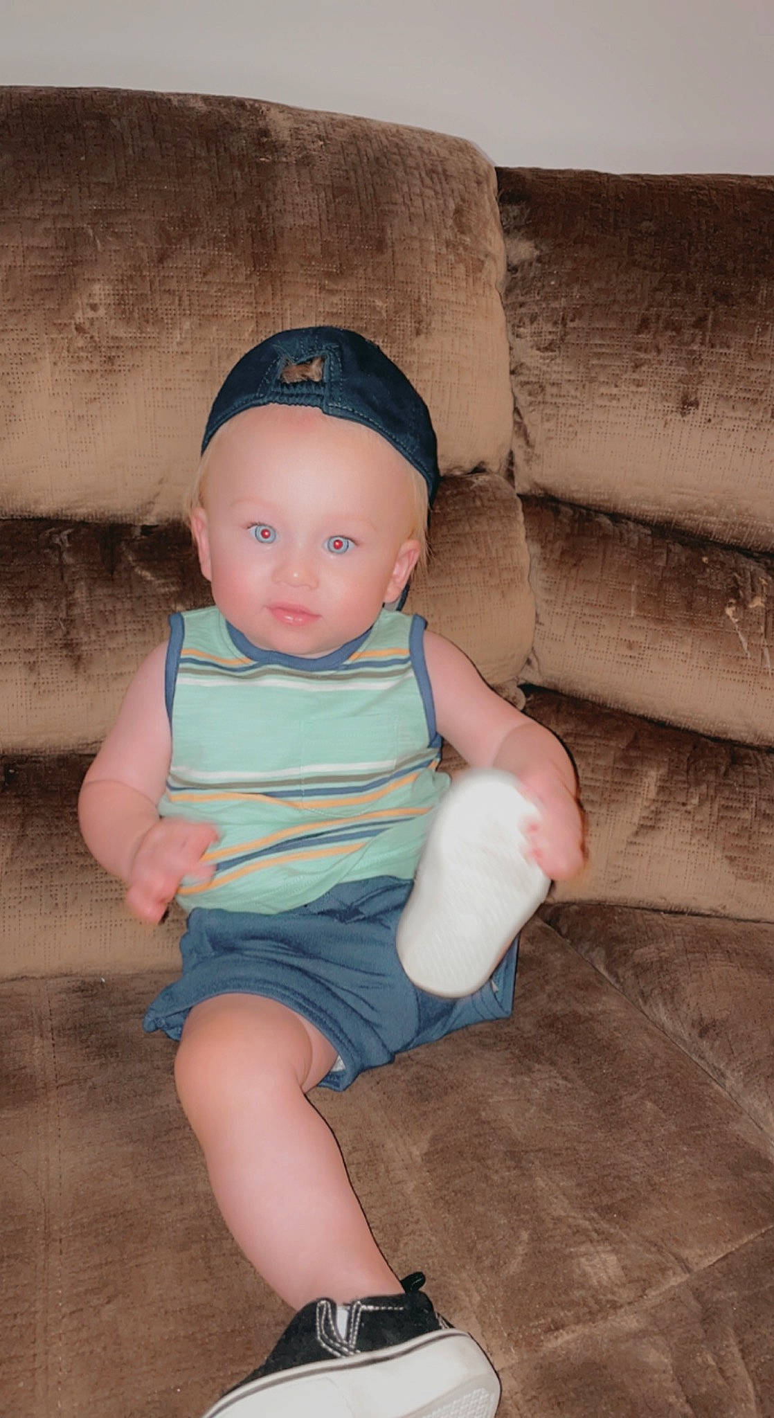 Cayman is registered to the contest to win money with this photo: baby_toddler_clothing, chin, cool, eye, facial_expression, hairstyle, head, joint, knee, mouth, neck, person, product, shorts, shoulder, skin, sleeve, standing, t_shirt, textile