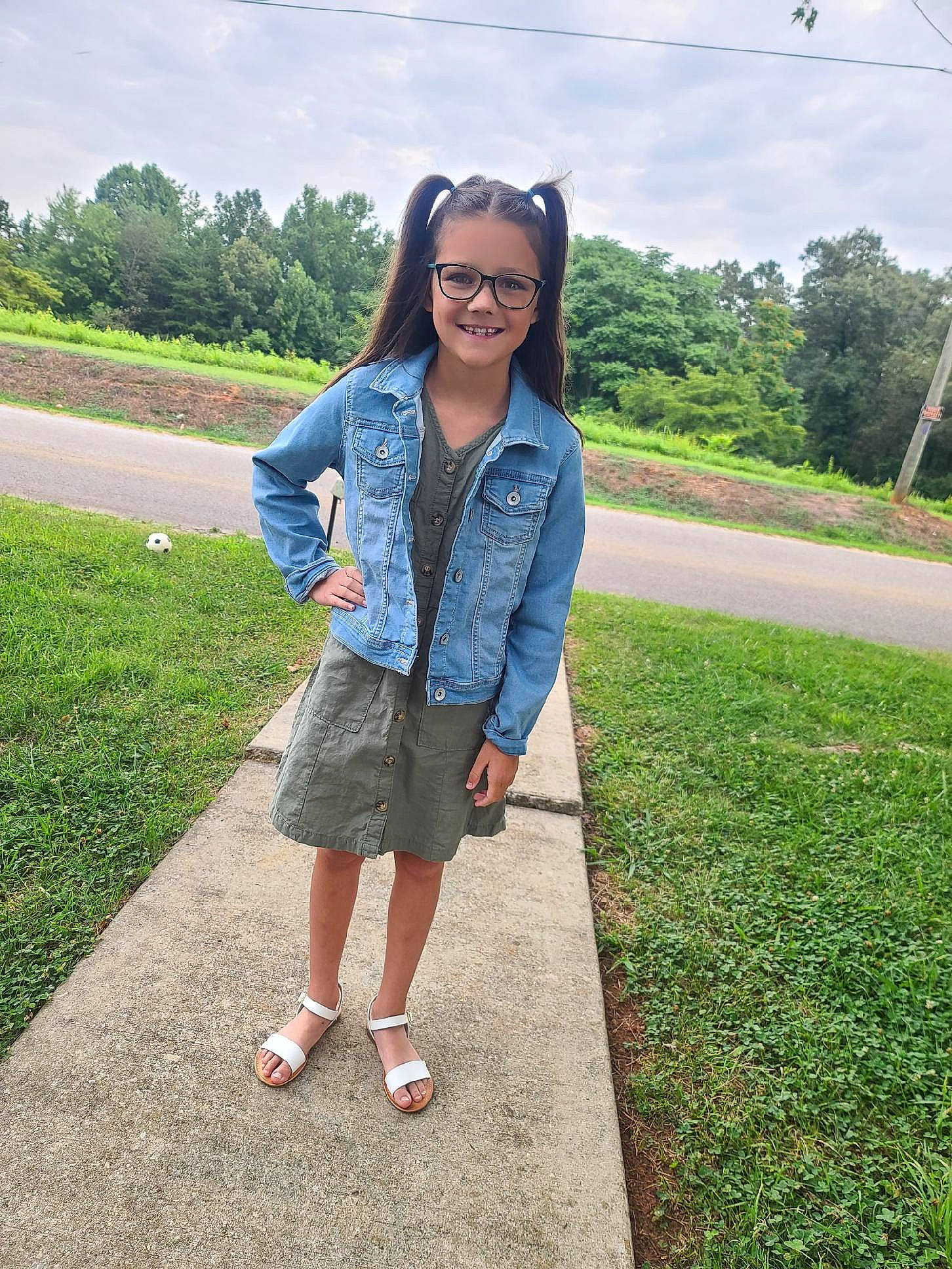 Nevaeh joined the competition — help win amazing prizes! asphalt, denim, electric_blue, eyewear, fun, grass, grassland, joy, knee, leisure, pattern, person, plaid, plant, recreation, sky, sleeve, smile, street_fashion, sunglasses