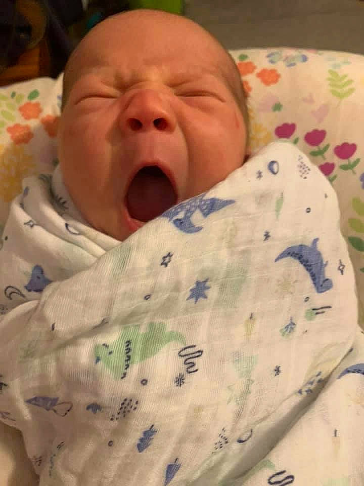 Benji is registered to the contest to win money with this photo: baby, baby_products, baby_safety, baby_sleeping, baby_toddler_clothing, bedding, bedtime, cheek, child, chin, comfort, event, linens, pattern, person, room, skin, sleep, sleeve, thumb