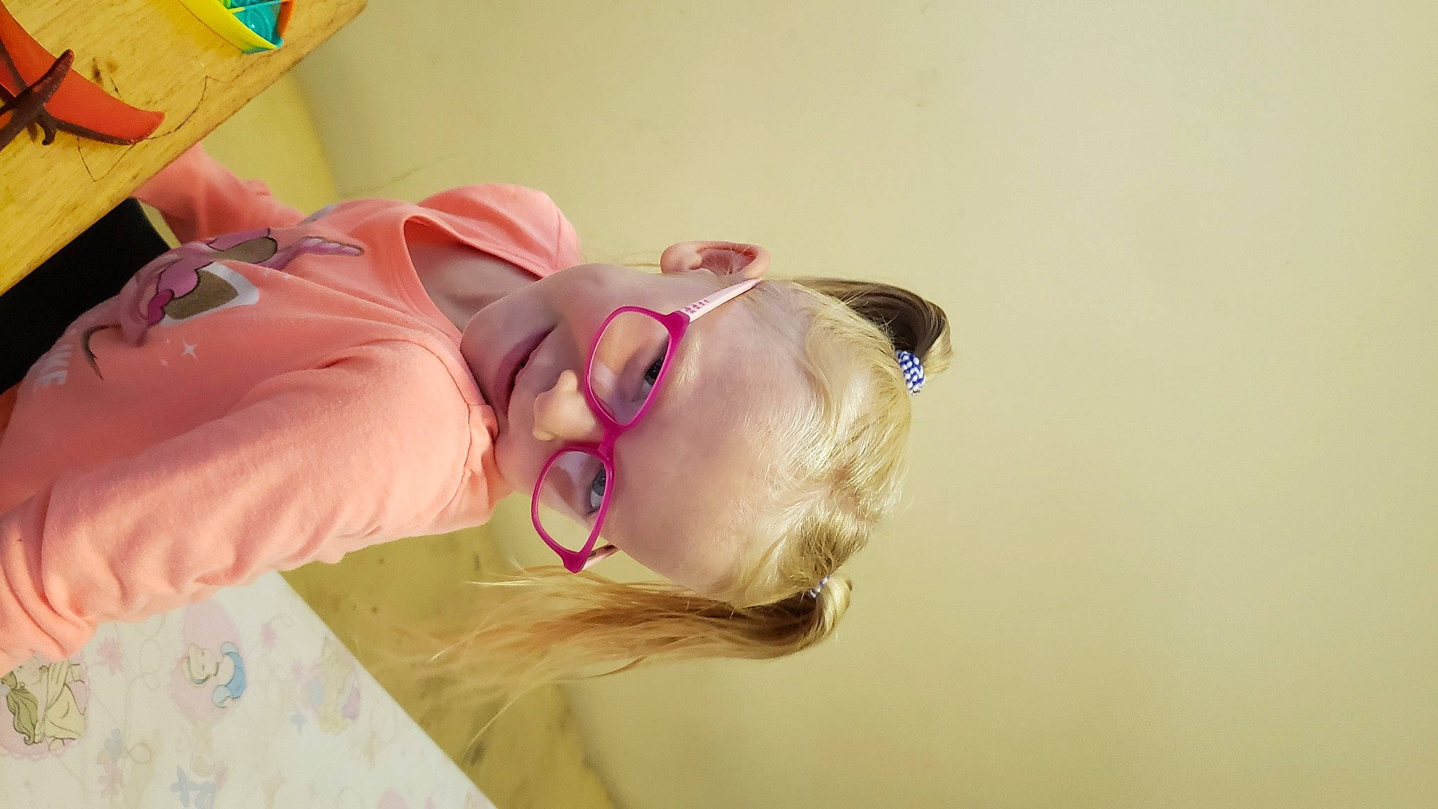 Kinzleigh joined the competition — help win amazing prizes! baby, brown_hair, child, ear, eyelash, eyewear, fun, glasses, happy, headband, headpiece, joy, long_hair, magenta, neck, person, personal_protective_equipment, skin, smile, sunglasses
