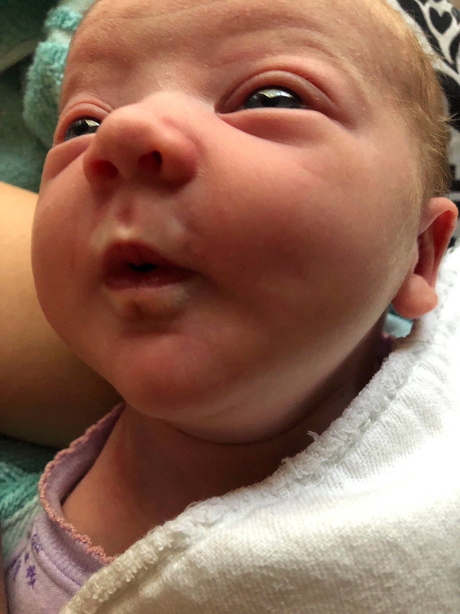 Teigan is registered to the contest to win money with this photo: baby, cheek, child, chin, close_up, ear, eye, eyebrow, face, facial_expression, forehead, head, headwear, jaw, lip, mouth, neck, nose, person, skin