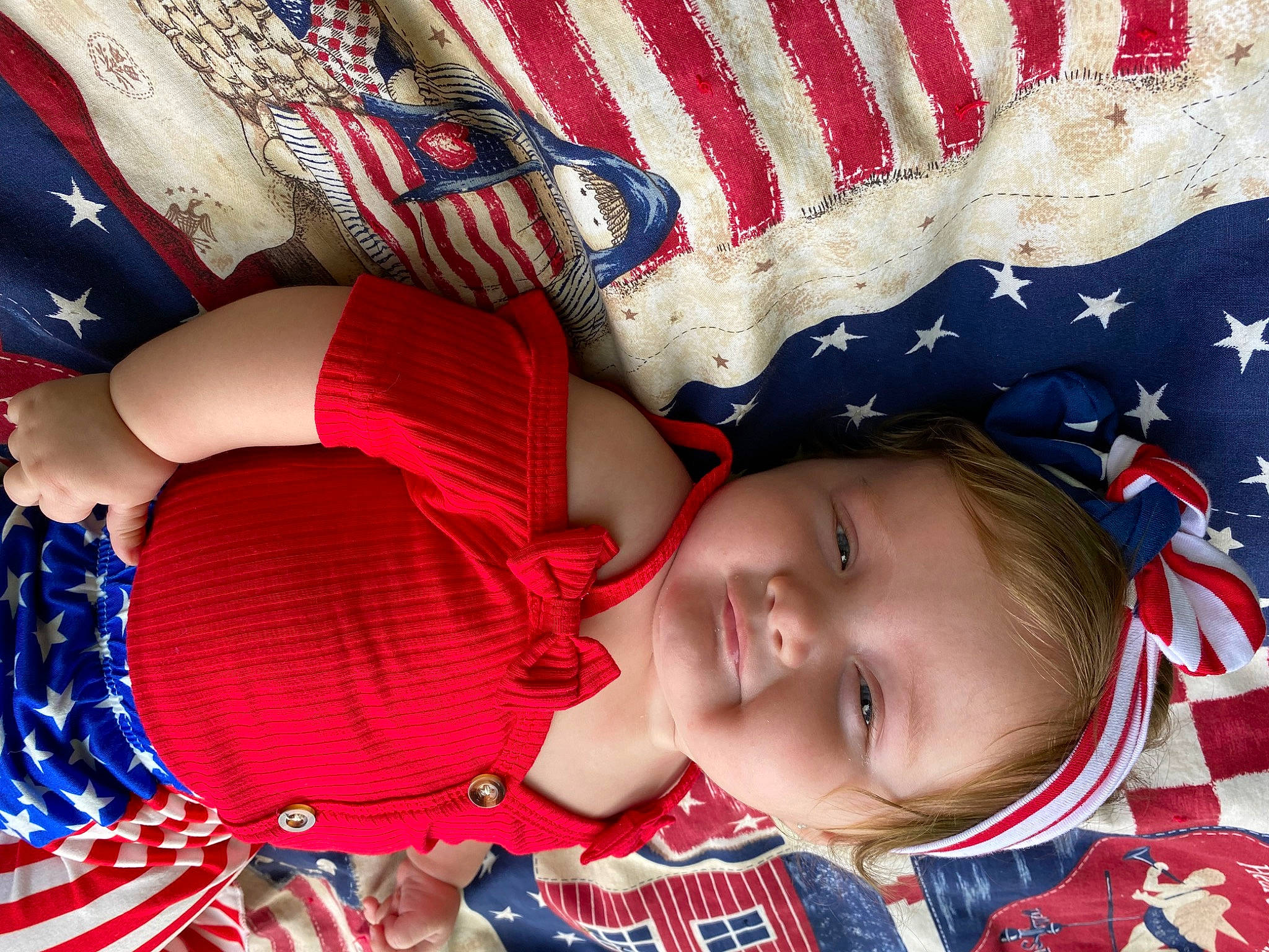 Madeline is registered to the contest to win money with this photo: baby, baby_toddler_clothing, beauty, blue, cheek, child, electric_blue, facial_expression, fun, happy, organ, pattern, people, person, product, red, sleeve, smile, textile, toddler