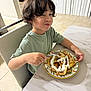 boy, breakfast, chair, child, cute, dining, food, fork, green_shirt, hair, indoor, kitchen, marble_table, pancakes, plate, smile, table, tile_floor, whipped_cream, winking