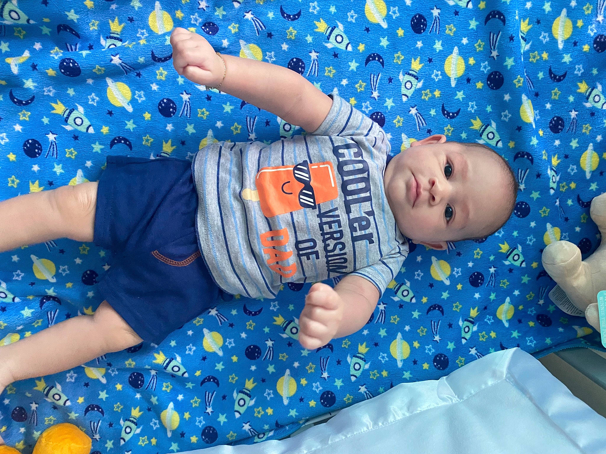 Jayviel is registered to the contest to win money with this photo: azure, baby, baby_toddler_clothing, blue, child, electric_blue, fun, grass, happy, human_body, human_leg, leisure, linens, pattern, people_in_nature, person, play, recreation, sitting, textile