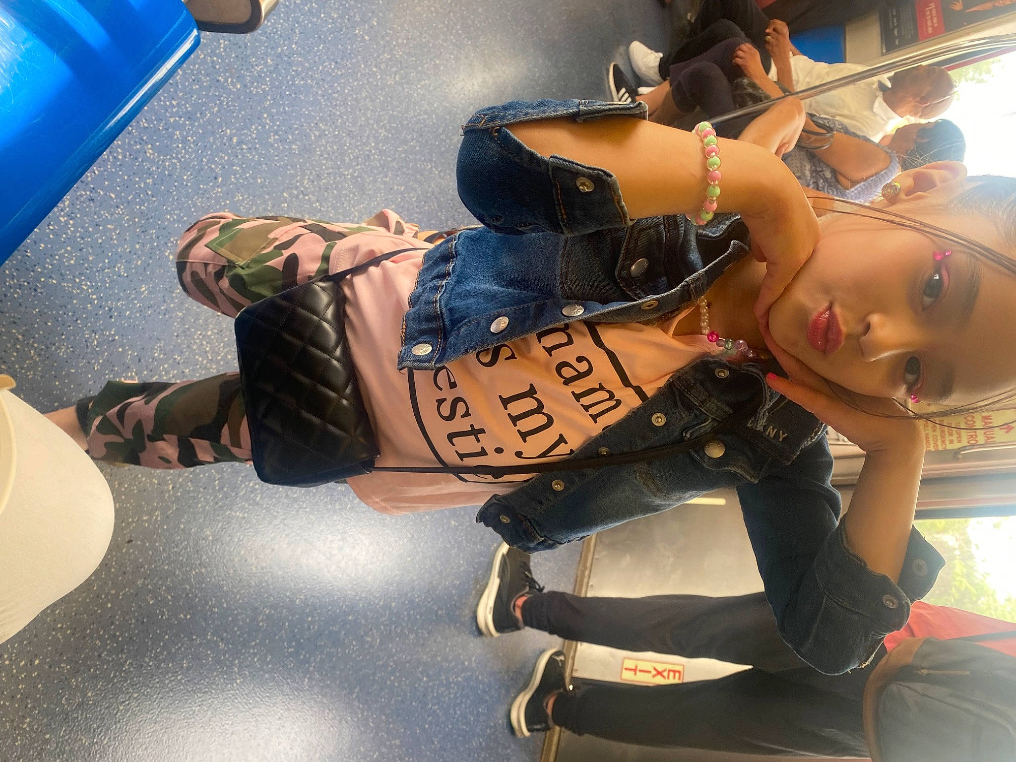 Giavonna is registered to the contest to win money with this photo: abdomen, automotive_design, boot, comfort, cool, elbow, eyewear, fictional_character, foot, fun, glove, human_leg, knee, leg, person, personal_protective_equipment, sandal, shoe, sitting, thigh