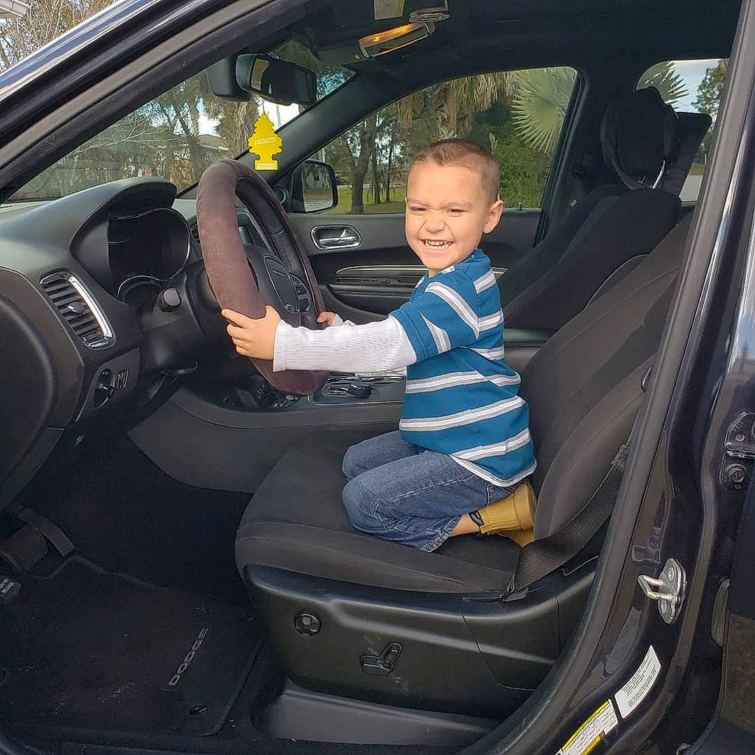 Aiyden joined the competition — help win amazing prizes! car, car_seat, car_seat_cover, driving, family_car, head_restraint, joy, kia_sportage, mid_size_car, person, plant, vehicle, vehicle_door