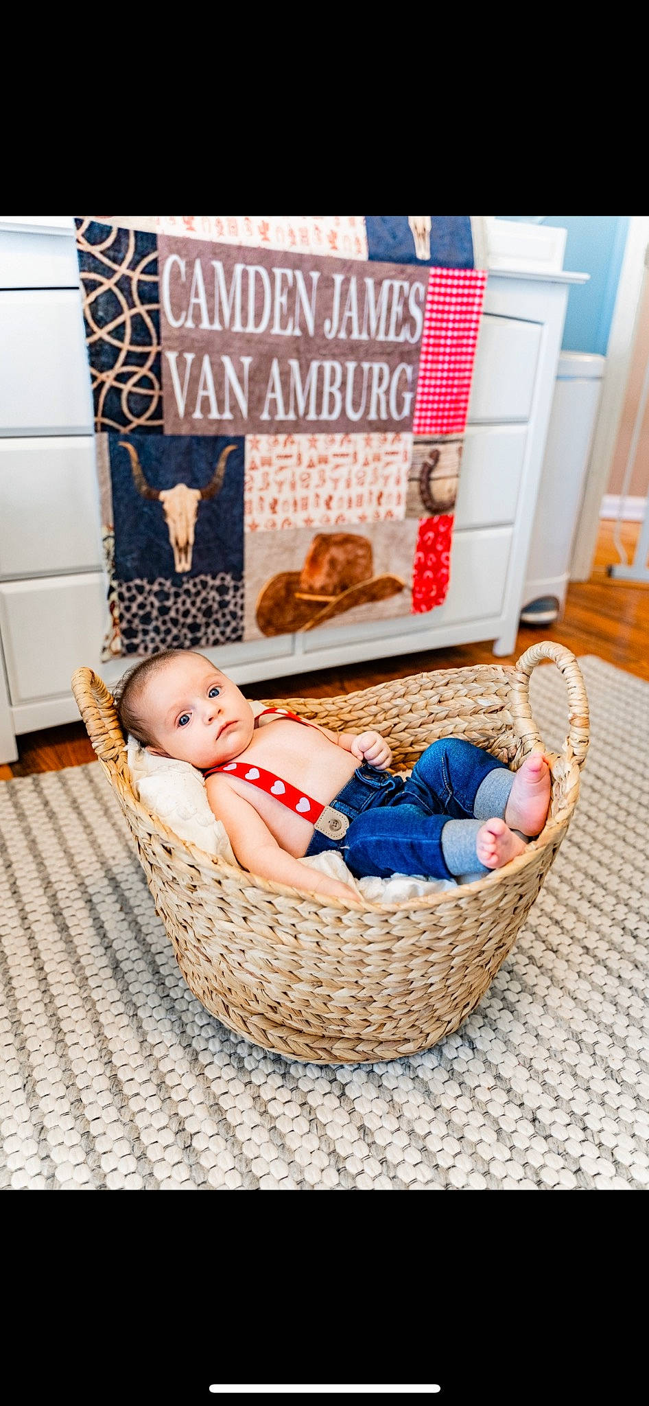 Camden is registered to the contest to win money with this photo: baby, baby_products, baby_safety, basket, child, comfort, door, event, fashion_accessory, flooring, home_accessories, infant_bed, linens, pattern, person, product, room, smile, toddler, wicker