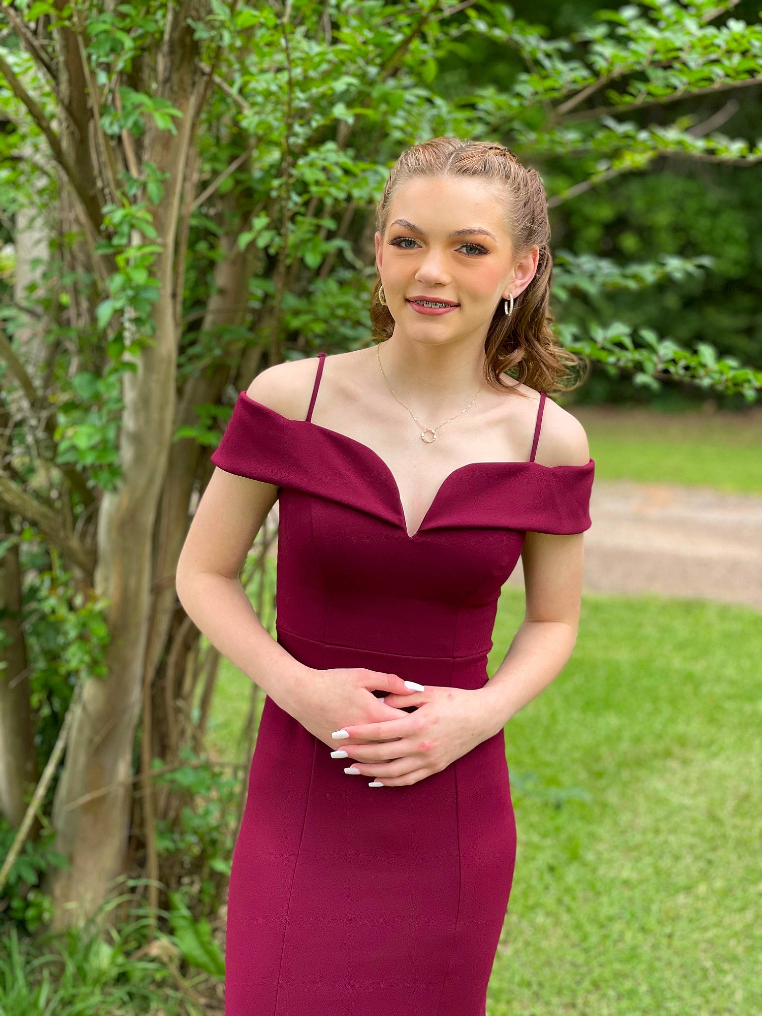 Skylar is registered to the contest to win money with this photo: abdomen, belt, chest, day_dress, electric_blue, event, formal_wear, gown, grass, hair, joy, magenta, one_piece_garment, people_in_nature, person, plant, sleeve, smile, thigh, tree