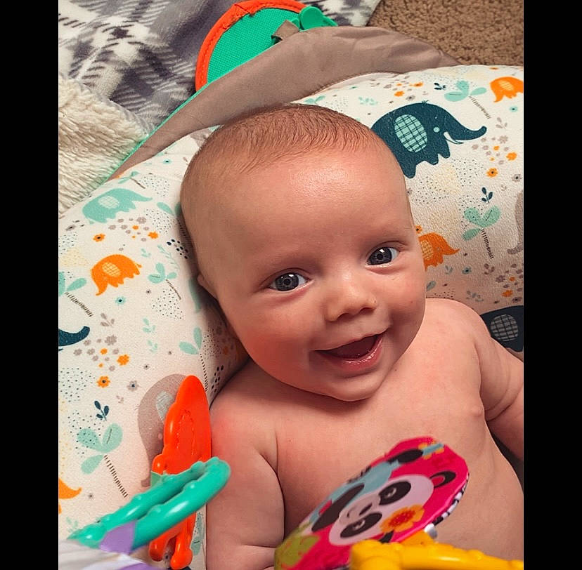 Wesley is registered to the contest to win money with this photo: baby, baby_playing_with_toys, baby_products, bathing, cheek, chest, child, eyebrow, finger, fun, happy, iris, leisure, mouth, nose, person, pink, product, skin, smile