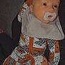 Lennox joined the competition — help win amazing prizes! baby, infant, pacifier, onesie, clothing, patterned_clothing, orange, white, sleepwear, bib, face, head, person, child, newborn, cute, indoors, resting, portrait, young