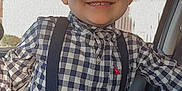 Maxamos joined the competition — help win amazing prizes! child, smiling, blond_hair, checkered_shirt, suspenders, denim_jeans, car_interior, backpack, spiderman, window, building, seatbelt, happy, casual_clothing, young, portrait, indoors, seat, buttoned_shirt, light