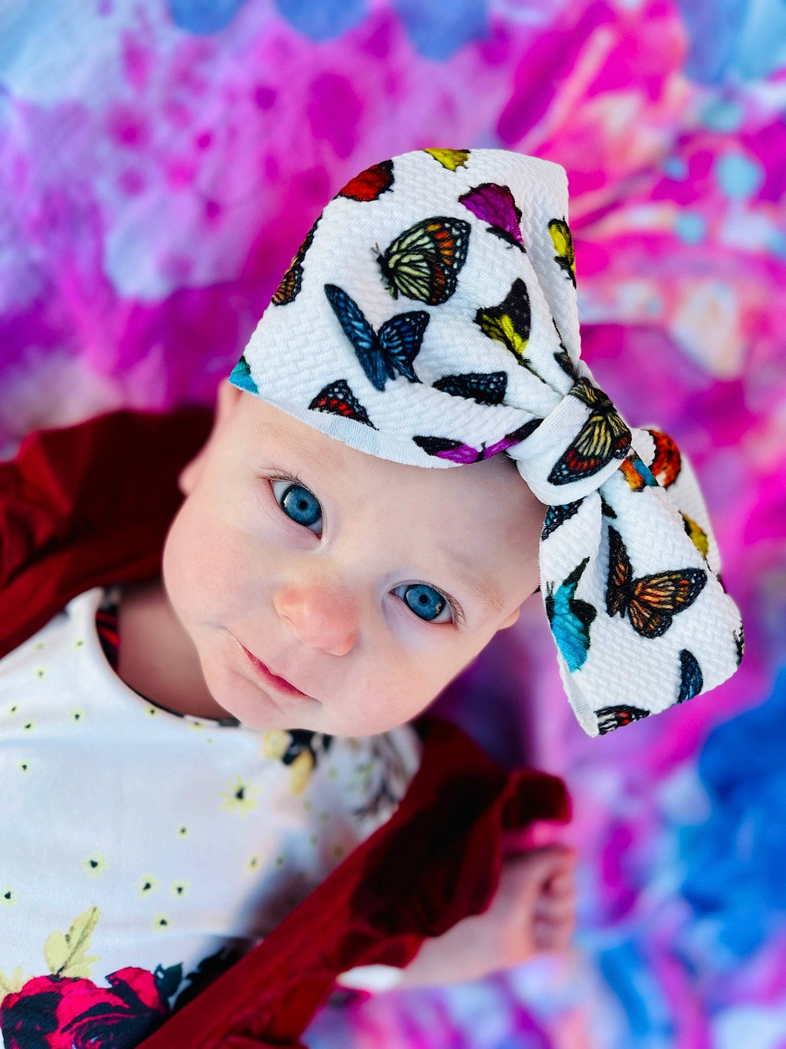 Miley is registered to the contest to win money with this photo: art, baby, baby_toddler_clothing, cap, costume_hat, event, fashion_accessory, fur, happy, hat, headgear, headwear, magenta, pattern, person, petal, pink, plant, purple, sleeve