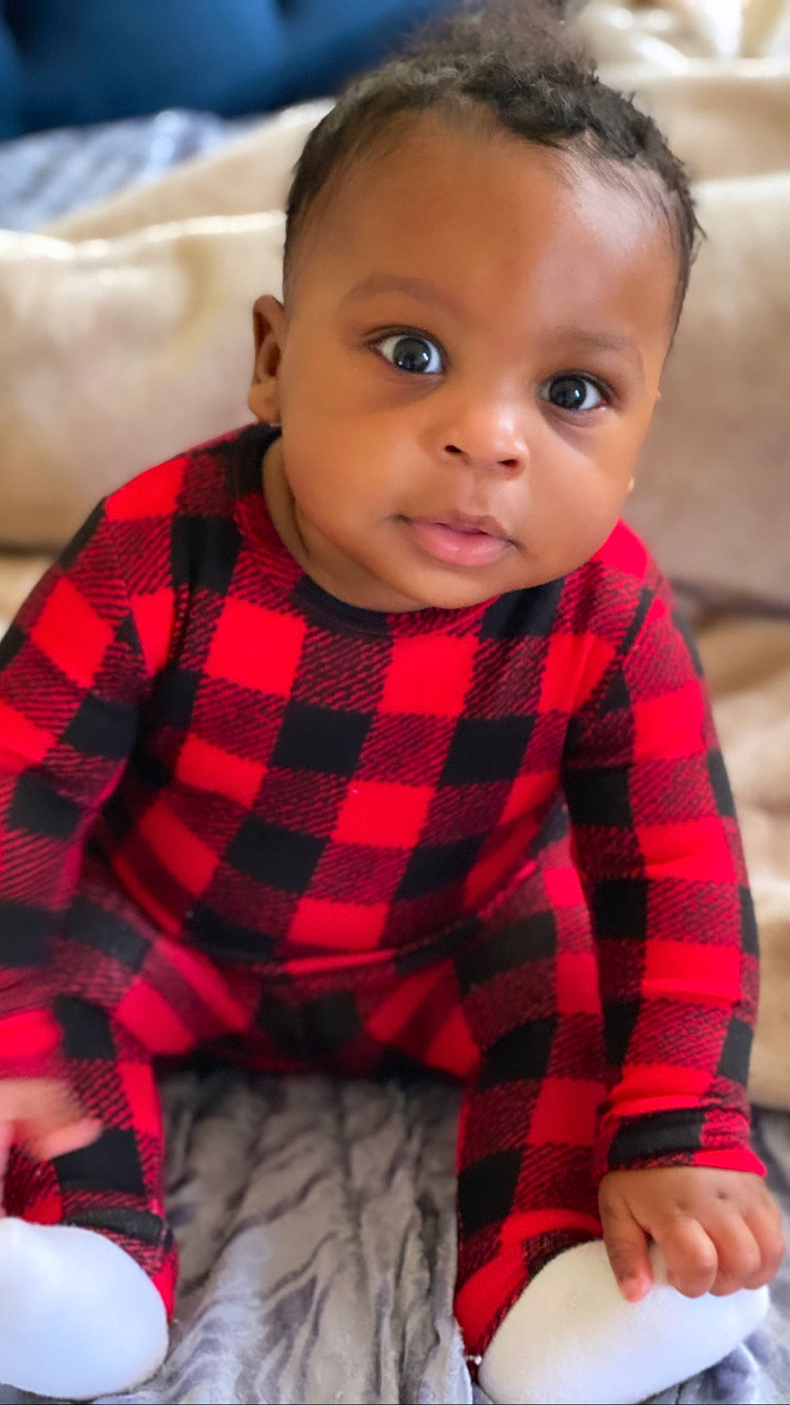 Damari joined the competition — help win amazing prizes! baby, baby_toddler_clothing, cheek, child, collar, dress_shirt, eye, eyelash, head, iris, linens, pattern, person, plaid, sitting, skin, sleeve, tartan, textile, toddler