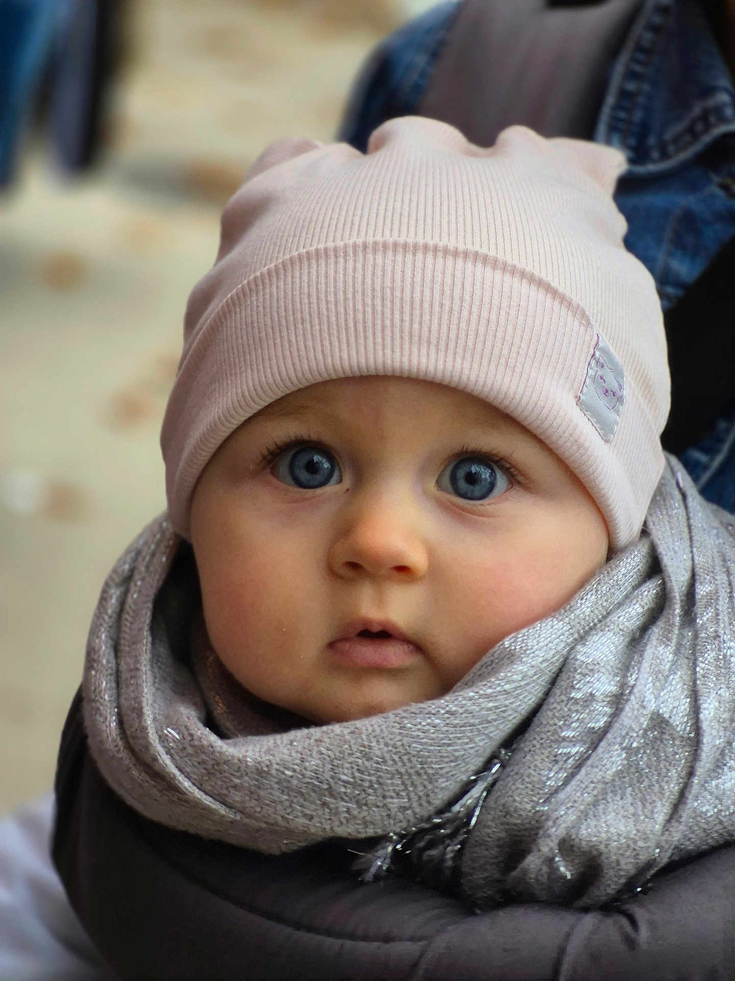 Deborah-Ema participe au concours pour gagner de l'argent avec cette photo : baby, child, face, blue_eyes, beanie, scarf, winter_clothing, portrait, close_up, cute, warm, soft_light, outdoor, young_child, infant, headwear, expression, skin, person, apparel