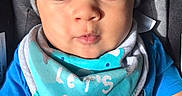 Kingston joined the competition — help win amazing prizes! baby, blue_bib, gray_hat, wide_eyes, cute, infant, child, clothing, face, portrait, sitting, closeup, expression, hat, text_on_bib, casual, indoor, person, young_child, adorable