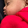 baby, cheeks, child, close_up, closed_eyes, cute, ear, face, hair, indoors, infant, peaceful, photography, pink_clothing, portrait, pout, red_clothing, sleeping, snuggled, soft_lighting