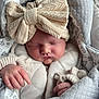 newborn, baby, sleeping, hat, bow, knitwear, blanket, cozy, soft, infant, cute, wrapped, hands, face, peaceful, warm, child, portrait, textile, fabric