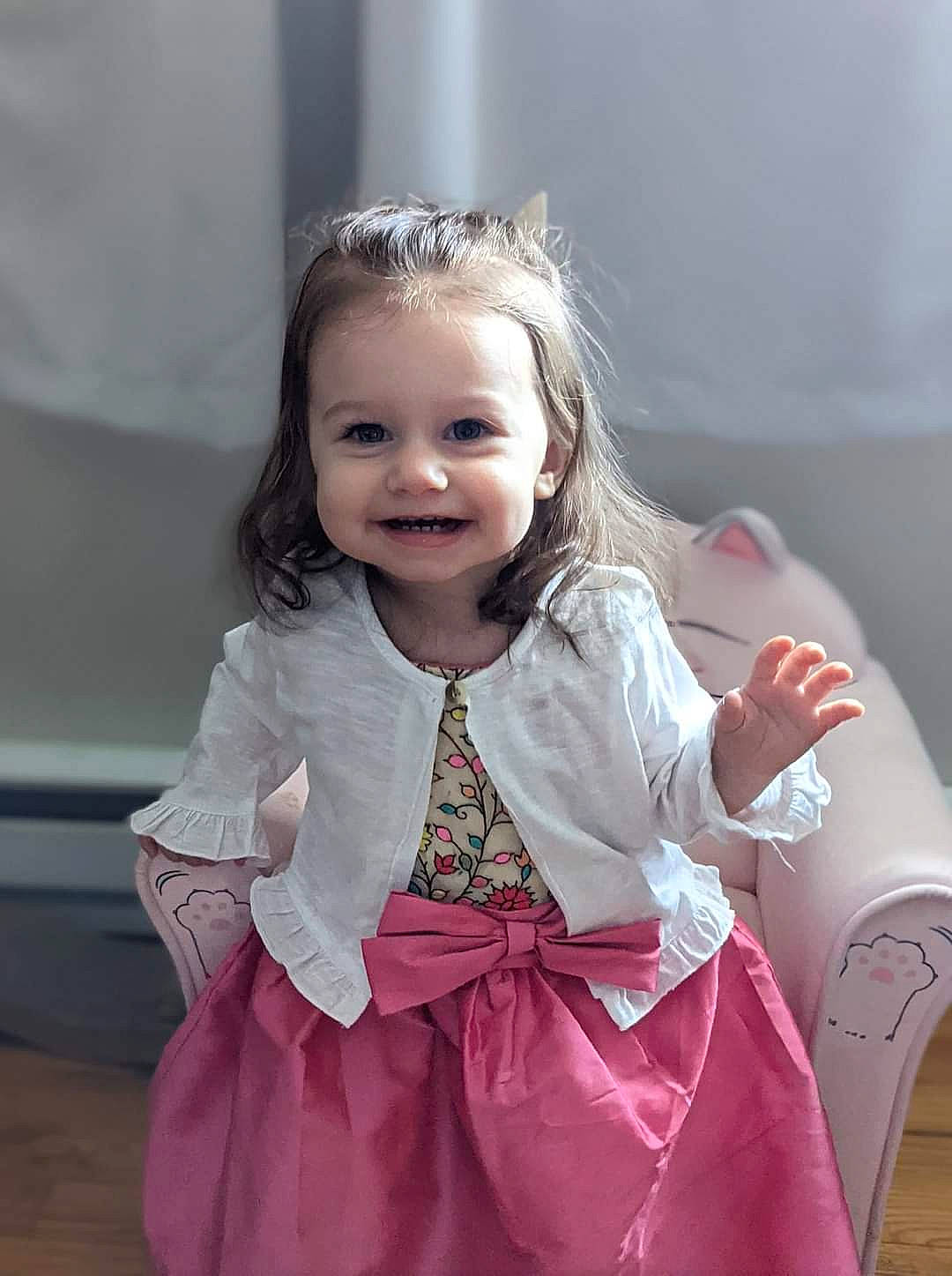Leona is registered to the contest to win money with this photo: baby_toddler_clothing, beauty, child, day_dress, dress, eye, flash_photography, formal_wear, fun, gesture, happy, iris, joy, magenta, person, pink, shoulder, skin, sleeve, smile