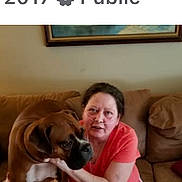 Joe Perkins Perkins joined the competition — help win amazing prizes! animal, brown_dog, casual_clothing, comfort, companion, couch, dog, friendship, furniture, home, human, indoor, leash, living_room, medium_hair, pet, portrait, relaxed, seated, woman