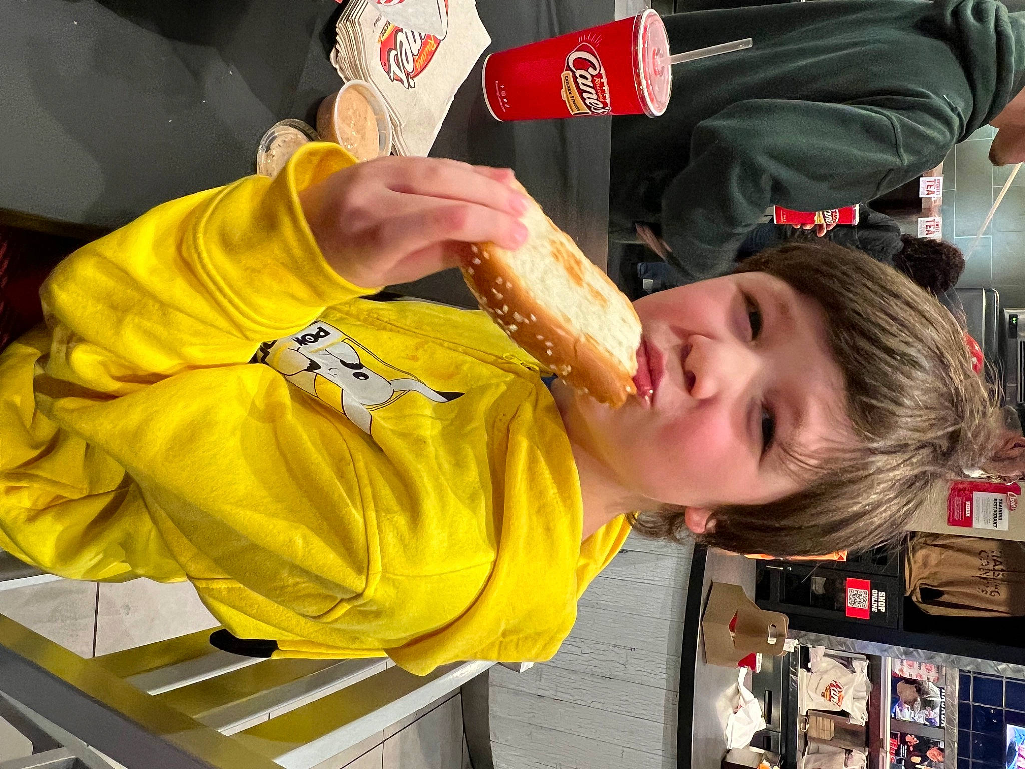 Clayton is registered to the contest to win money with this photo: aluminum_can, beer, beverage_can, drink, drinking, fun, gesture, junk_food, logo, person, smile, uniform