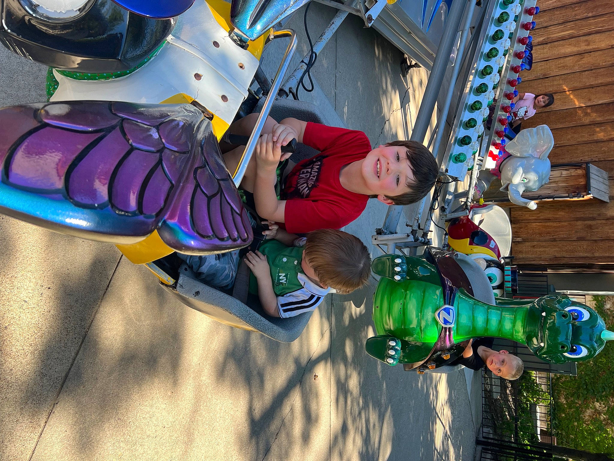 Clayton is registered to the contest to win money with this photo: adventure, automotive_tire, bottle, electric_blue, fiction, fictional_character, fun, helmet, joy, leisure, machine, person, personal_protective_equipment, recreation, smile, sneakers, space, sports_gear, toddler, walking_shoe