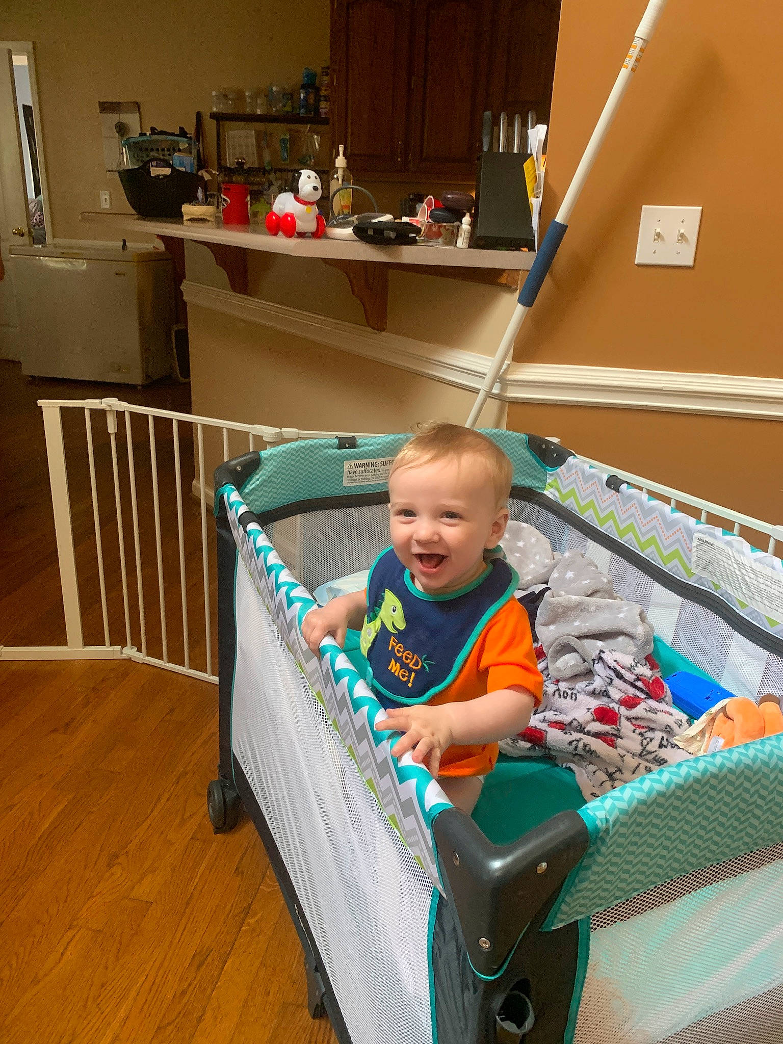 Erik is registered to the contest to win money with this photo: baby, baby_products, baby_safety, baby_toddler_clothing, cart, child, comfort, flooring, hardwood, infant_bed, leisure, person, product, room, shelf, sitting, smile, tire, toddler, wood