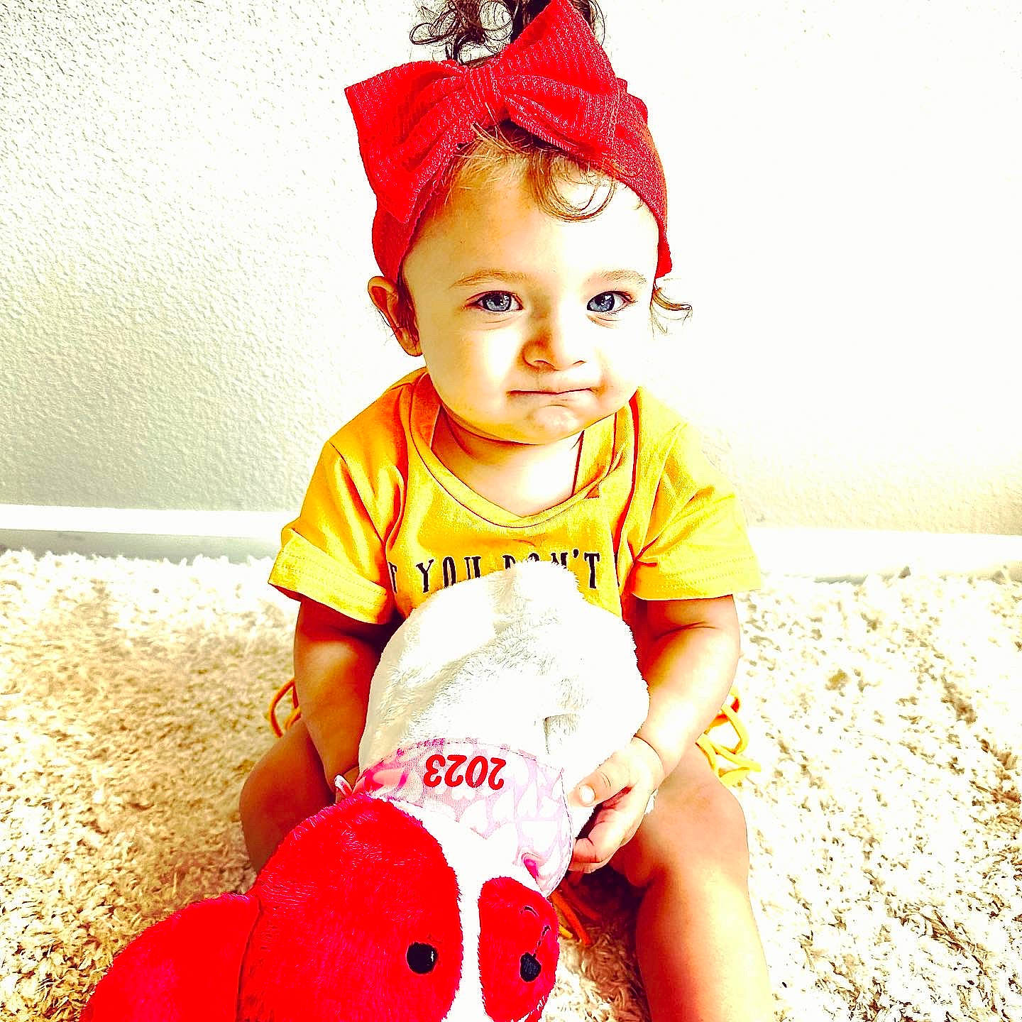 Amira joined the competition — help win amazing prizes! baby, baby_toddler_clothing, cap, carmine, child, costume_hat, facial_expression, fashion_accessory, fun, happy, pattern, people_in_nature, person, portrait_photography, red, shorts, sitting, sleeve, smile, t_shirt