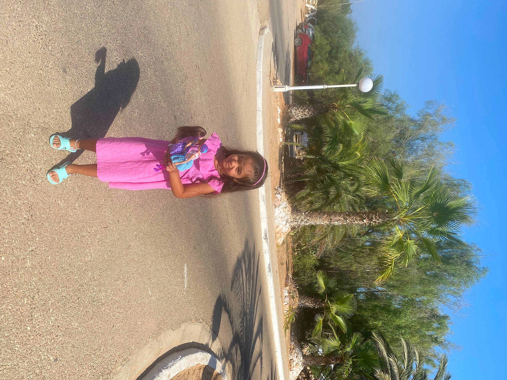 Kelya participe au concours pour gagner de l'argent avec cette photo : arecales, bicycle_tire, bicycle_wheel, fun, joy, leisure, magenta, morning, person, plant, recreation, shadow, sky, smile, tints_and_shades, tire, toddler, tree, vacation, wheel
