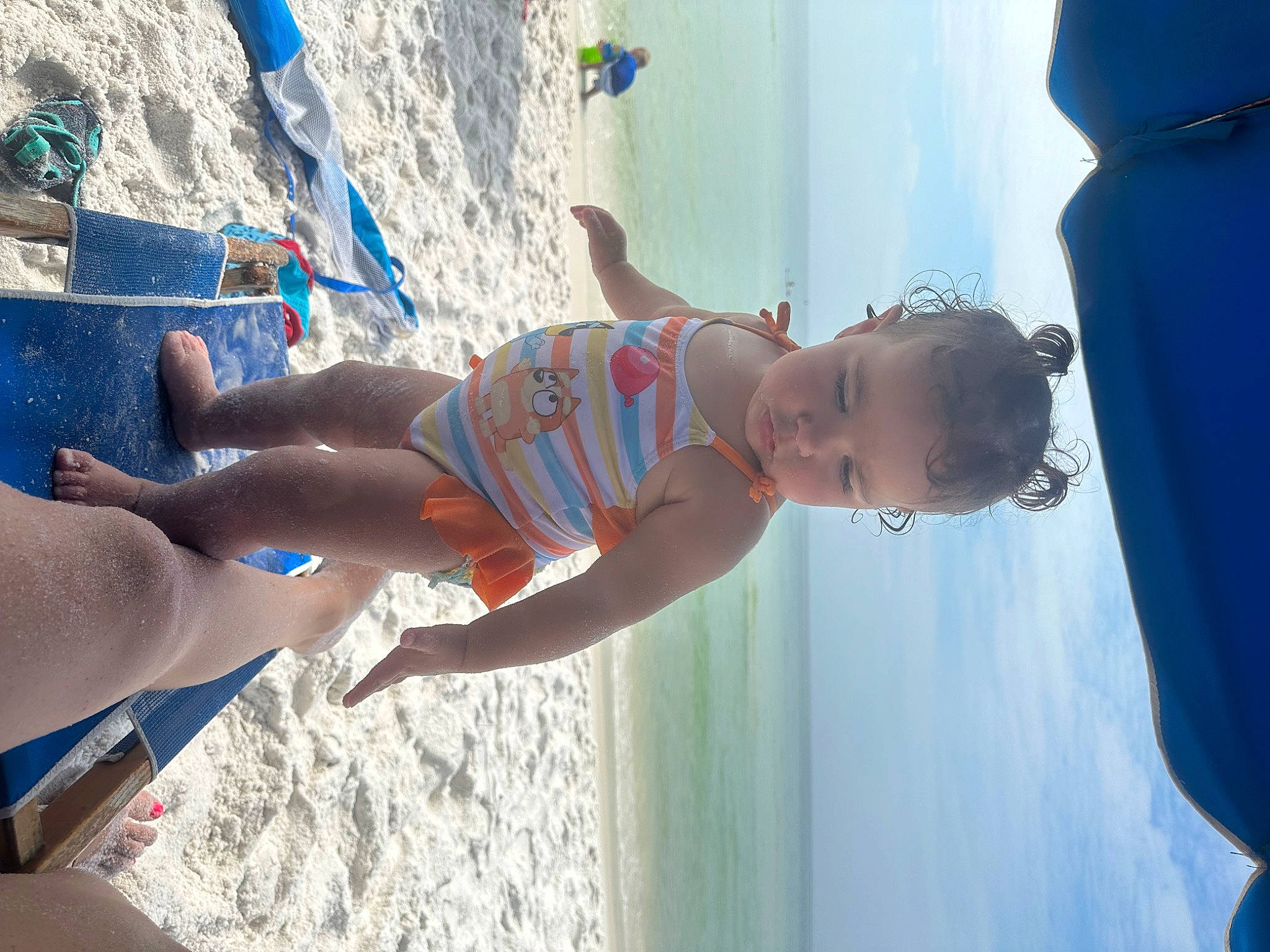 Brylee joined the competition — help win amazing prizes! barechested, beach, blue, elbow, electric_blue, fun, happy, human_leg, joint, leisure, people_on_beach, person, recreation, sand, smile, swimwear, thigh, toddler, trunk, trunks