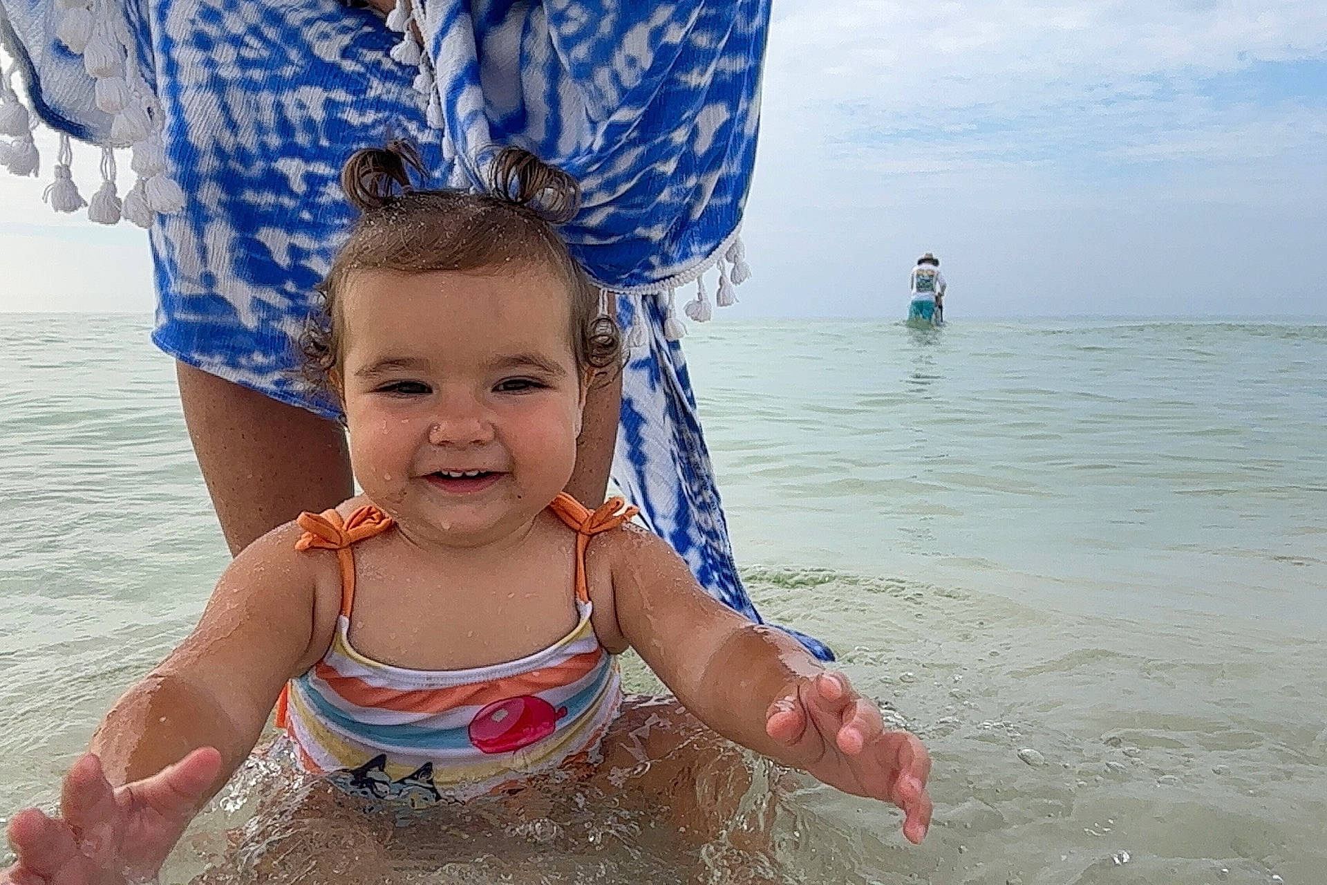 Brylee joined the competition — help win amazing prizes! azure, beach, blue, child, cloud, cool, fun, gesture, hairstyle, happy, joy, leisure, people_in_nature, people_on_beach, person, recreation, sky, smile, summer, toddler