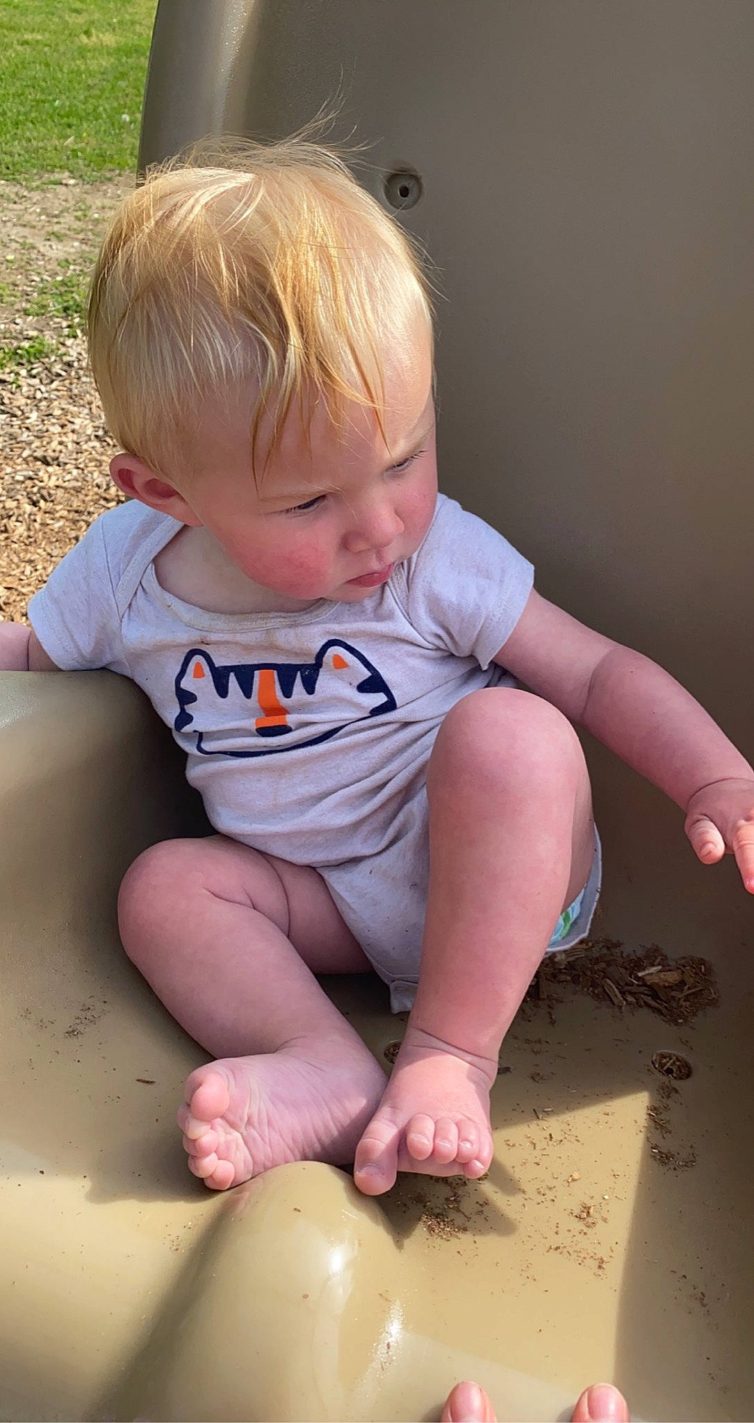 Nicholas is registered to the contest to win money with this photo: arm, baby_toddler_clothing, cheek, child, face, facial_expression, finger, hairstyle, head, human, knee, leg, people, person, pink, shorts, skin, sleeve, smile, thigh