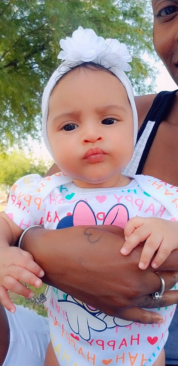 Jailynn joined the competition — help win amazing prizes! baby, baby_products, baby_toddler_clothing, cheek, child, finger, hair_accessory, hand, head, headwear, lip, mouth, nose, person, pink, product, skin, smile, toddler