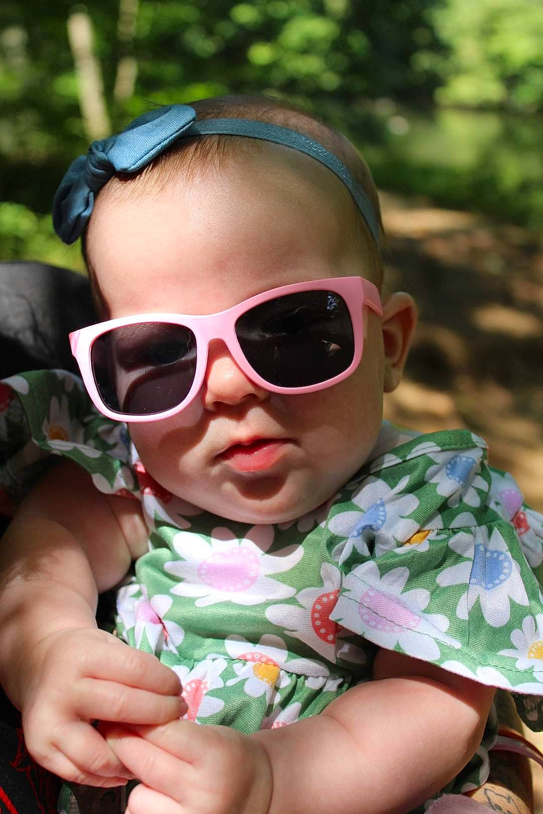 Addison joined the competition — help win amazing prizes! baby_toddler_clothing, cool, eyewear, fun, glasses, goggles, grass, hairstyle, hand, happy, leaf, leisure, lip, person, pink, plant, recreation, skin, sunglasses, toddler