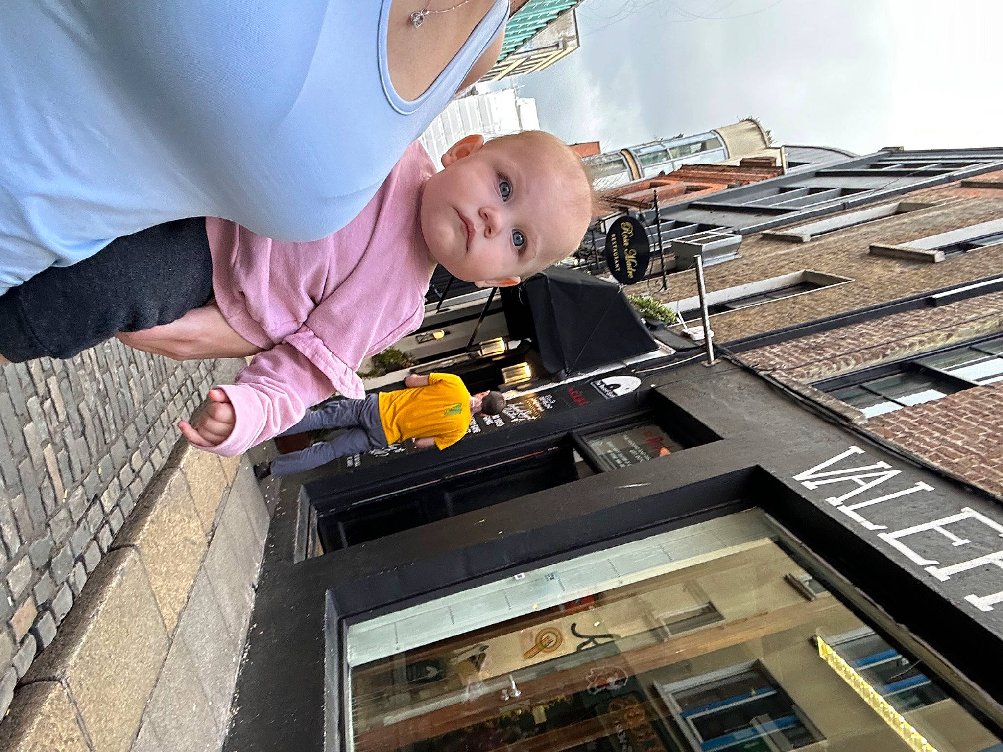 Charlotte joined the competition — help win amazing prizes! automotive_exterior, baby, baby_products, baby_toddler_clothing, building, child, facade, hat, machine, person, sitting, smile, t_shirt, tire, toddler, transport, window, wood