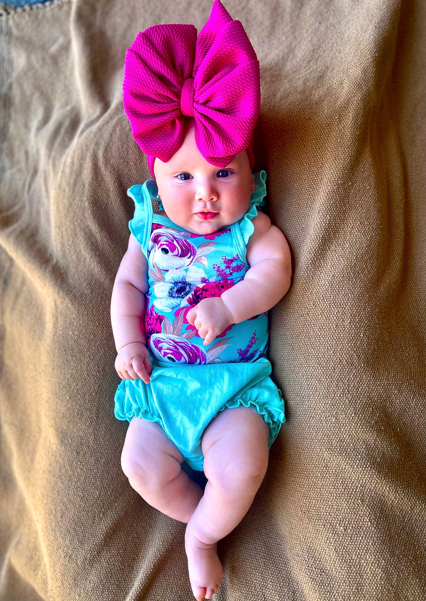 Emrynn joined the competition — help win amazing prizes! arm, baby, baby_toddler_clothing, cap, comfort, costume_hat, electric_blue, eye, happy, head, headpiece, human_body, magenta, neck, pattern, person, pink, purple, sleeve, t_shirt