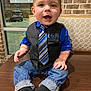 toddler, child, boy, portrait, indoor, table, vest, tie, blue_shirt, jeans, socks, brick_wall, window, restaurant, casual, cute, baby, smiling, person, seated